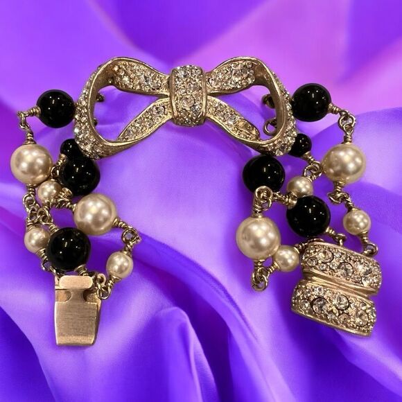Chanel Black and Gold Bow Bracelet - Picture 2 of 6